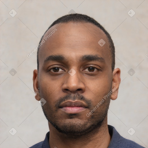 Neutral black young-adult male with short  black hair and brown eyes