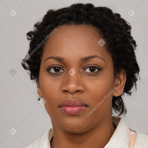 Neutral black young-adult female with medium  black hair and brown eyes