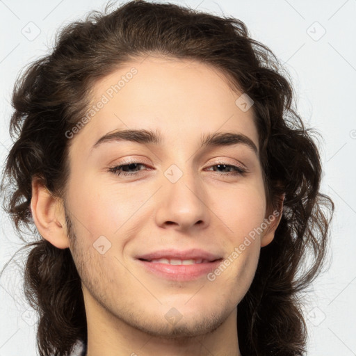 Joyful white young-adult male with medium  brown hair and brown eyes