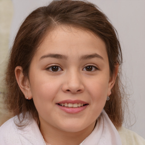 Joyful white child female with medium  brown hair and brown eyes