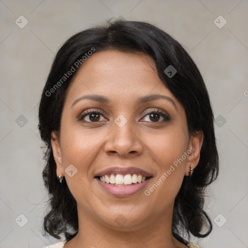 Joyful latino young-adult female with medium  brown hair and brown eyes