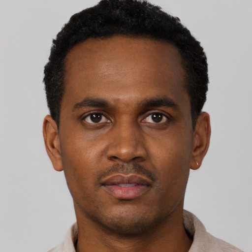 Neutral black young-adult male with short  black hair and brown eyes