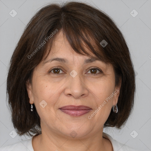 Joyful white adult female with medium  brown hair and brown eyes