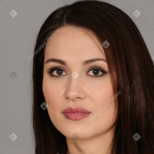 Neutral white young-adult female with long  brown hair and brown eyes