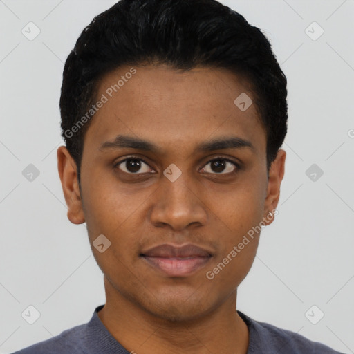 Joyful black young-adult male with short  black hair and brown eyes