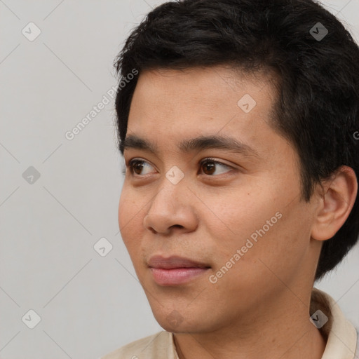 Neutral white young-adult male with short  black hair and brown eyes