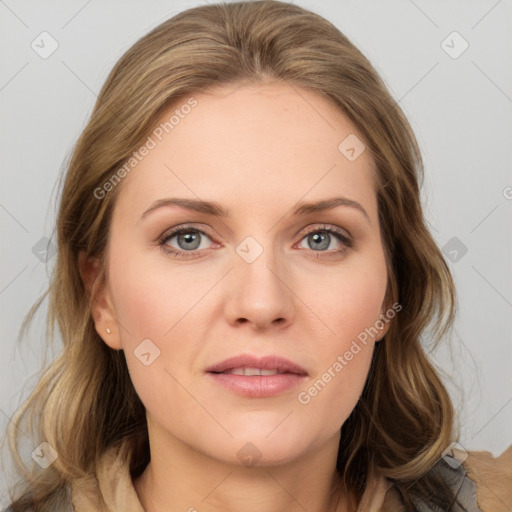 Joyful white young-adult female with long  brown hair and blue eyes