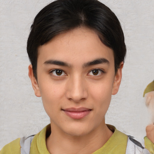 Joyful asian young-adult female with short  brown hair and brown eyes
