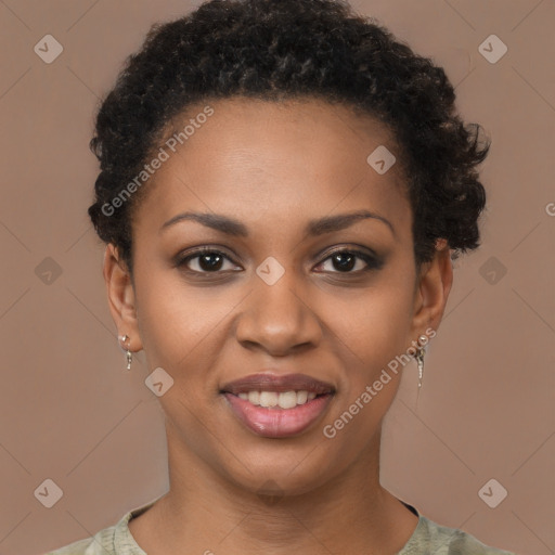 Joyful black young-adult female with short  brown hair and brown eyes