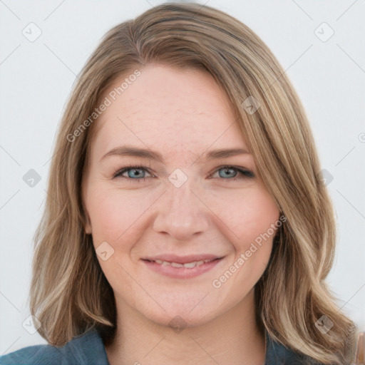 Joyful white young-adult female with medium  brown hair and blue eyes