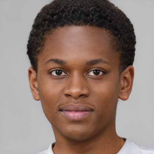 Joyful black young-adult male with short  brown hair and brown eyes