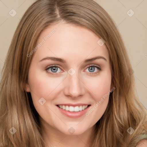 Joyful white young-adult female with long  brown hair and green eyes