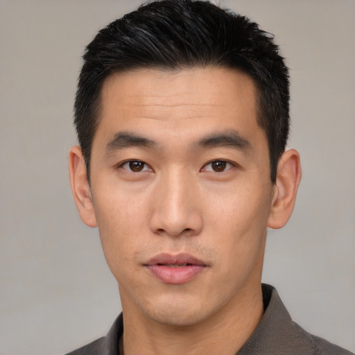 Neutral asian young-adult male with short  black hair and brown eyes