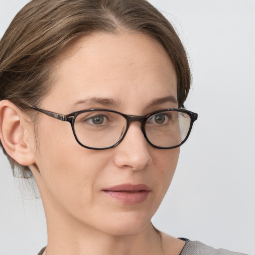 Neutral white young-adult female with medium  brown hair and brown eyes