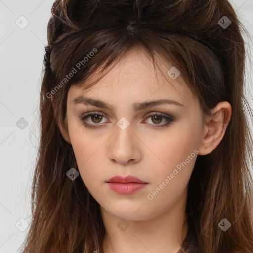 Neutral white young-adult female with long  brown hair and brown eyes