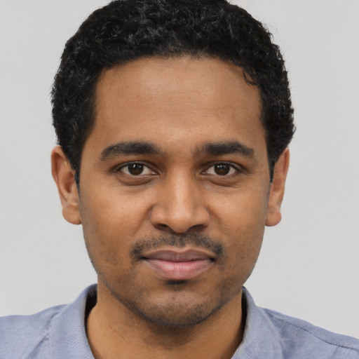 Neutral black young-adult male with short  black hair and brown eyes