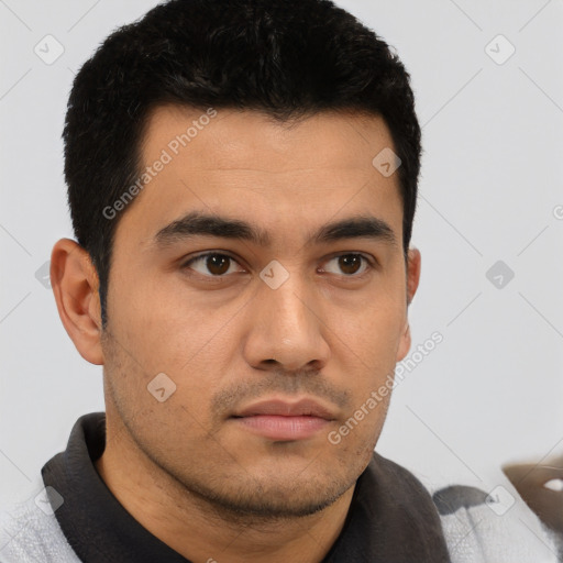 Neutral latino young-adult male with short  brown hair and brown eyes