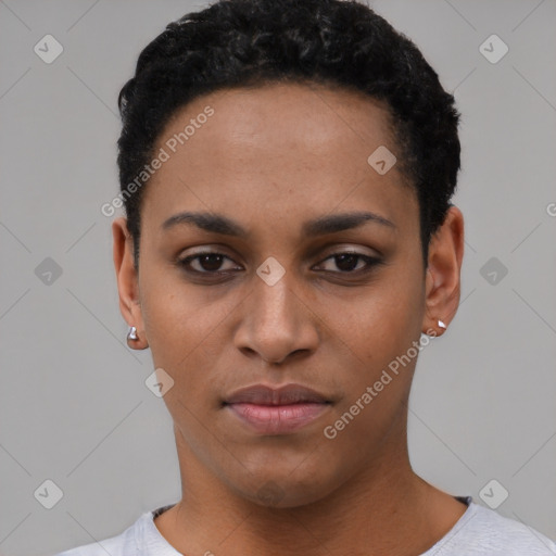 Joyful latino young-adult female with short  black hair and brown eyes