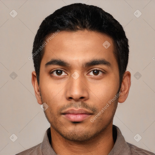 Neutral latino young-adult male with short  black hair and brown eyes