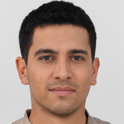 Neutral latino young-adult male with short  brown hair and brown eyes