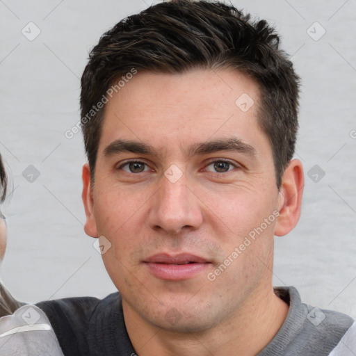 Neutral white adult male with short  brown hair and brown eyes