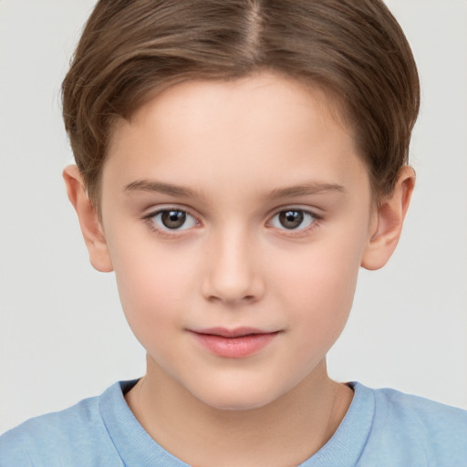 Joyful white child female with short  brown hair and brown eyes