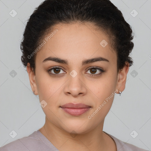 Joyful latino young-adult female with short  brown hair and brown eyes