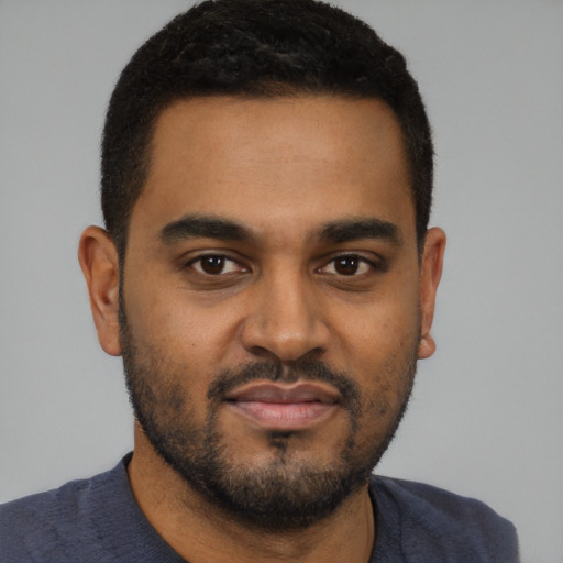 Neutral black young-adult male with short  black hair and brown eyes