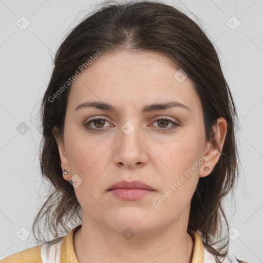 Neutral white young-adult female with medium  brown hair and brown eyes