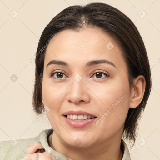 Joyful white young-adult female with medium  brown hair and brown eyes