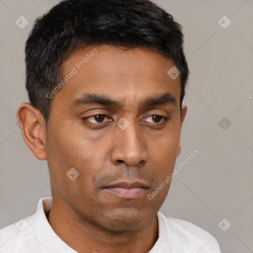Neutral latino young-adult male with short  brown hair and brown eyes
