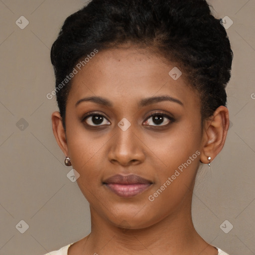 Joyful black young-adult female with short  brown hair and brown eyes