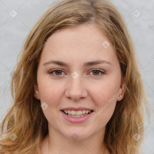 Joyful white young-adult female with long  brown hair and green eyes