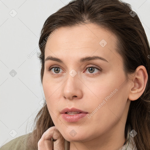 Neutral white young-adult female with medium  brown hair and grey eyes