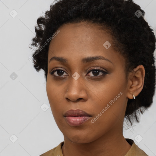 Neutral black young-adult female with medium  black hair and brown eyes