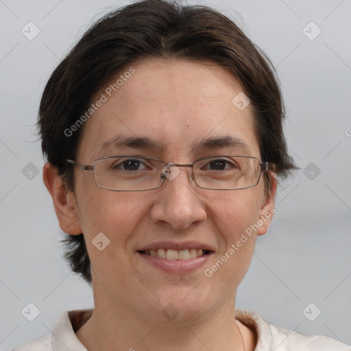 Joyful white adult female with short  brown hair and brown eyes