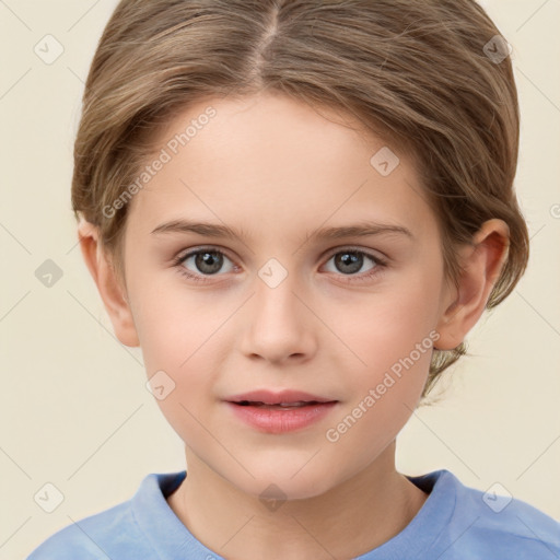 Joyful white child female with short  brown hair and brown eyes