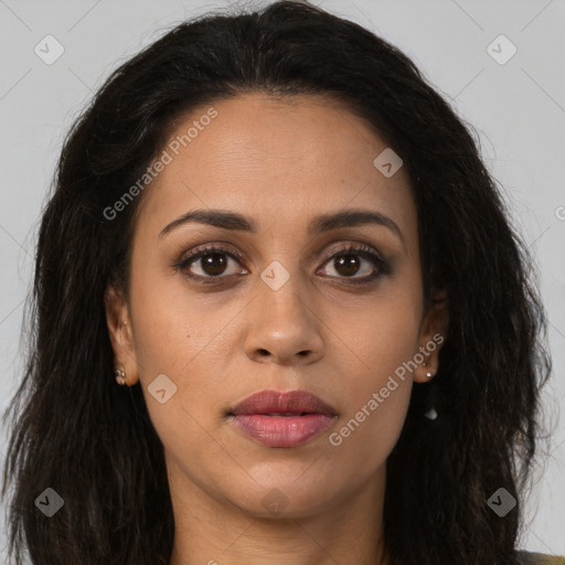 Joyful latino young-adult female with long  brown hair and brown eyes