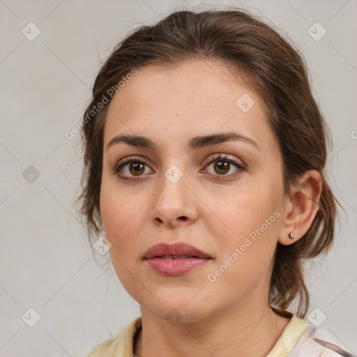 Neutral white young-adult female with medium  brown hair and brown eyes