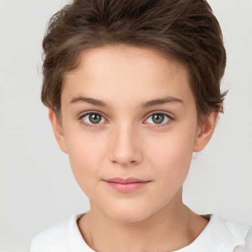 Joyful white child female with short  brown hair and brown eyes