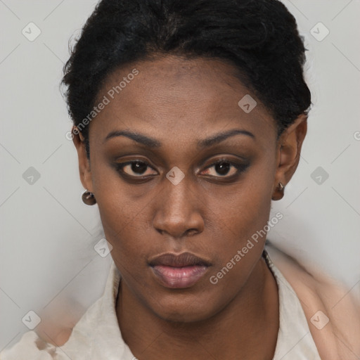 Neutral black young-adult female with short  brown hair and brown eyes