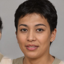 Joyful asian young-adult female with short  brown hair and brown eyes