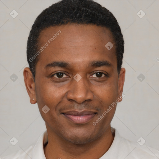 Joyful black young-adult male with short  black hair and brown eyes