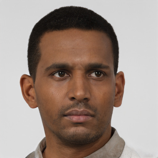 Neutral black young-adult male with short  black hair and brown eyes