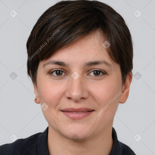 Joyful white young-adult female with short  brown hair and brown eyes