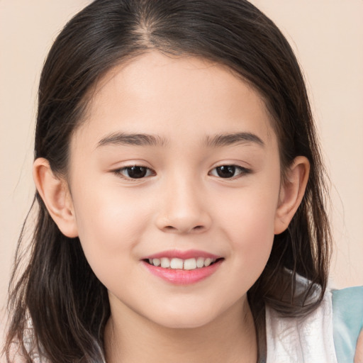 Joyful white child female with long  brown hair and brown eyes