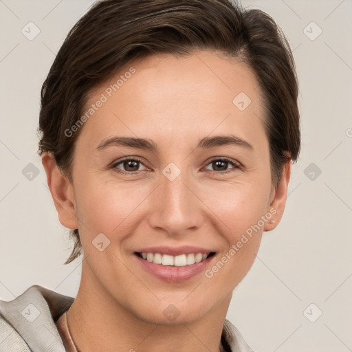 Joyful white young-adult female with short  brown hair and brown eyes