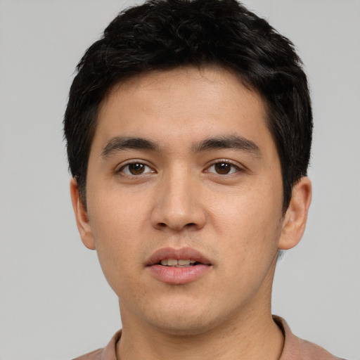 Neutral white young-adult male with short  black hair and brown eyes