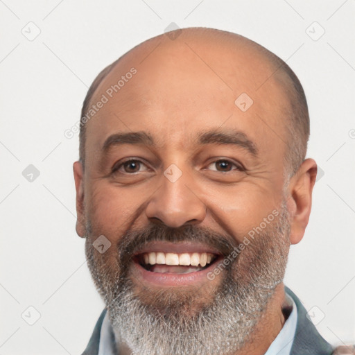 Joyful white adult male with short  black hair and brown eyes