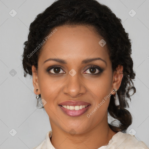 Joyful black young-adult female with medium  brown hair and brown eyes